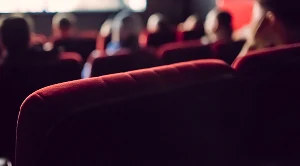 Red seats in a cinema (Generated with AI)