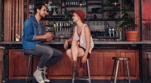 A couple enjoying the evenining in a pub. (Generated with AI)